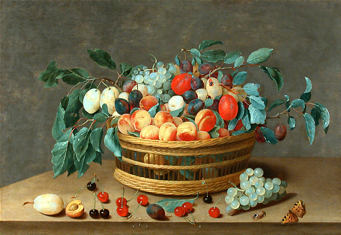 Basket with fruit and plum leaves